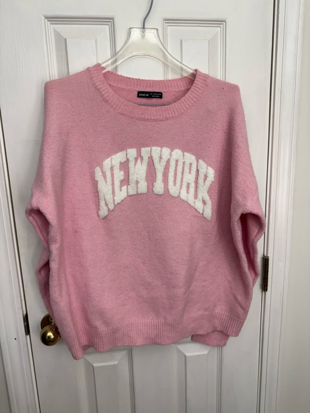 SHEIN Pink Crewneck Sweater with White 'NEW YORK' Text